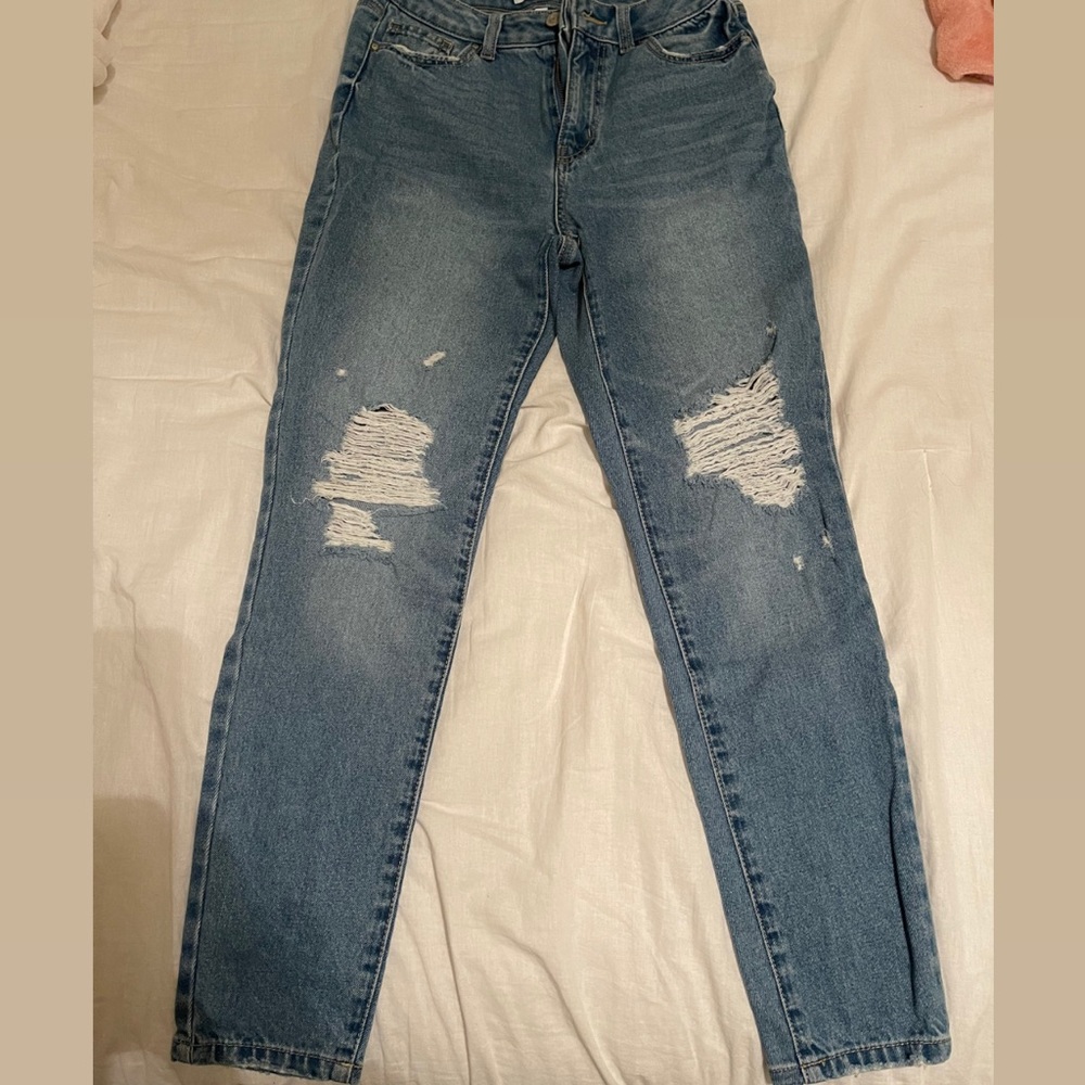 Fashion Nova ripped jeans.